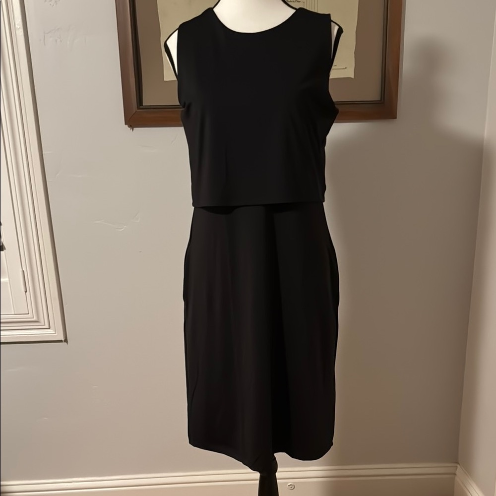 Black Sleeveless Sheath Midi Dress folds up for travel